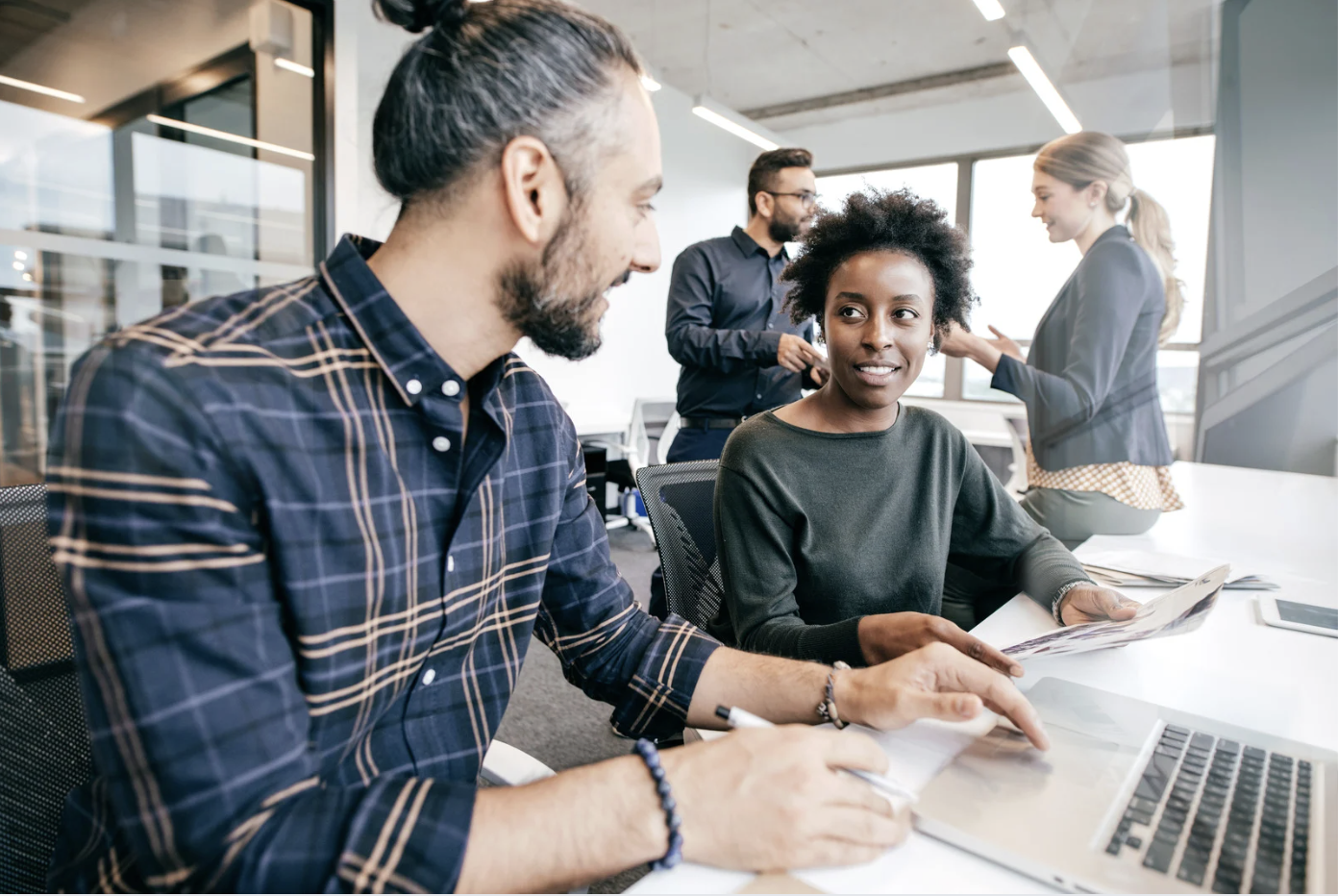 colleagues talking at work